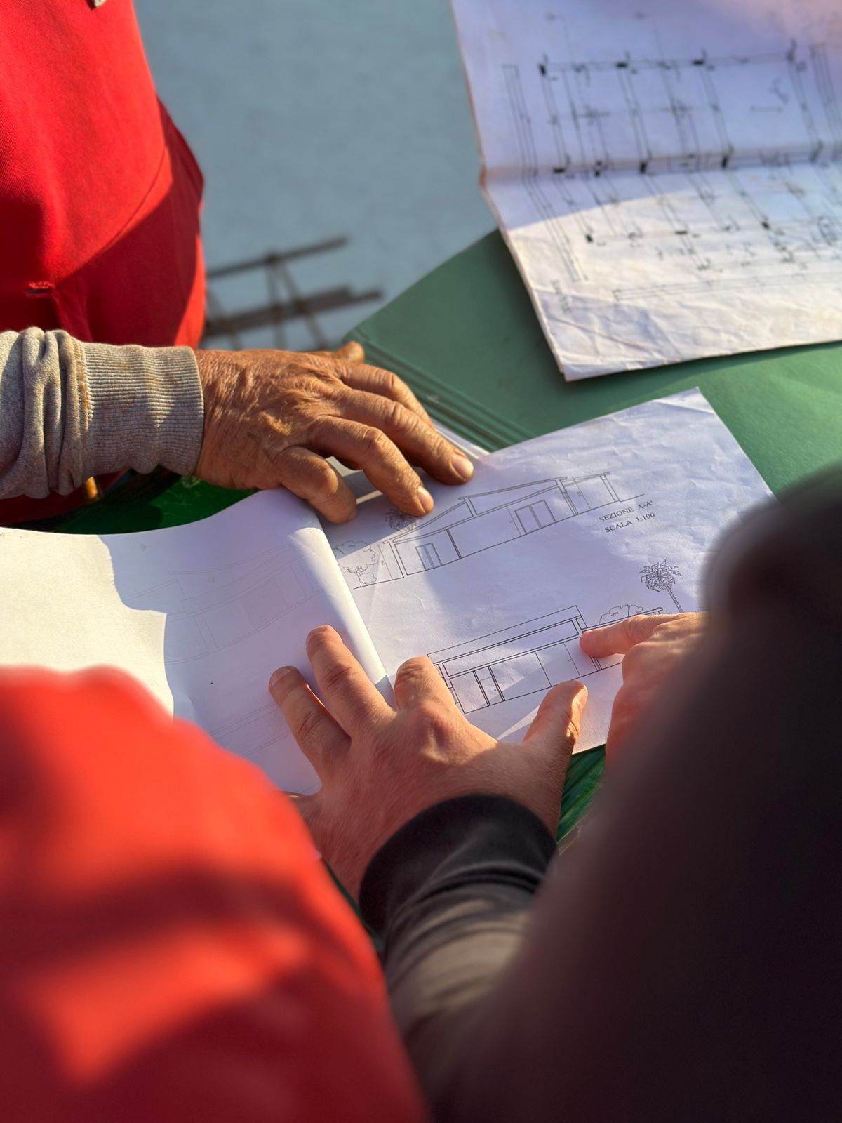 Field team reviewing site documentation